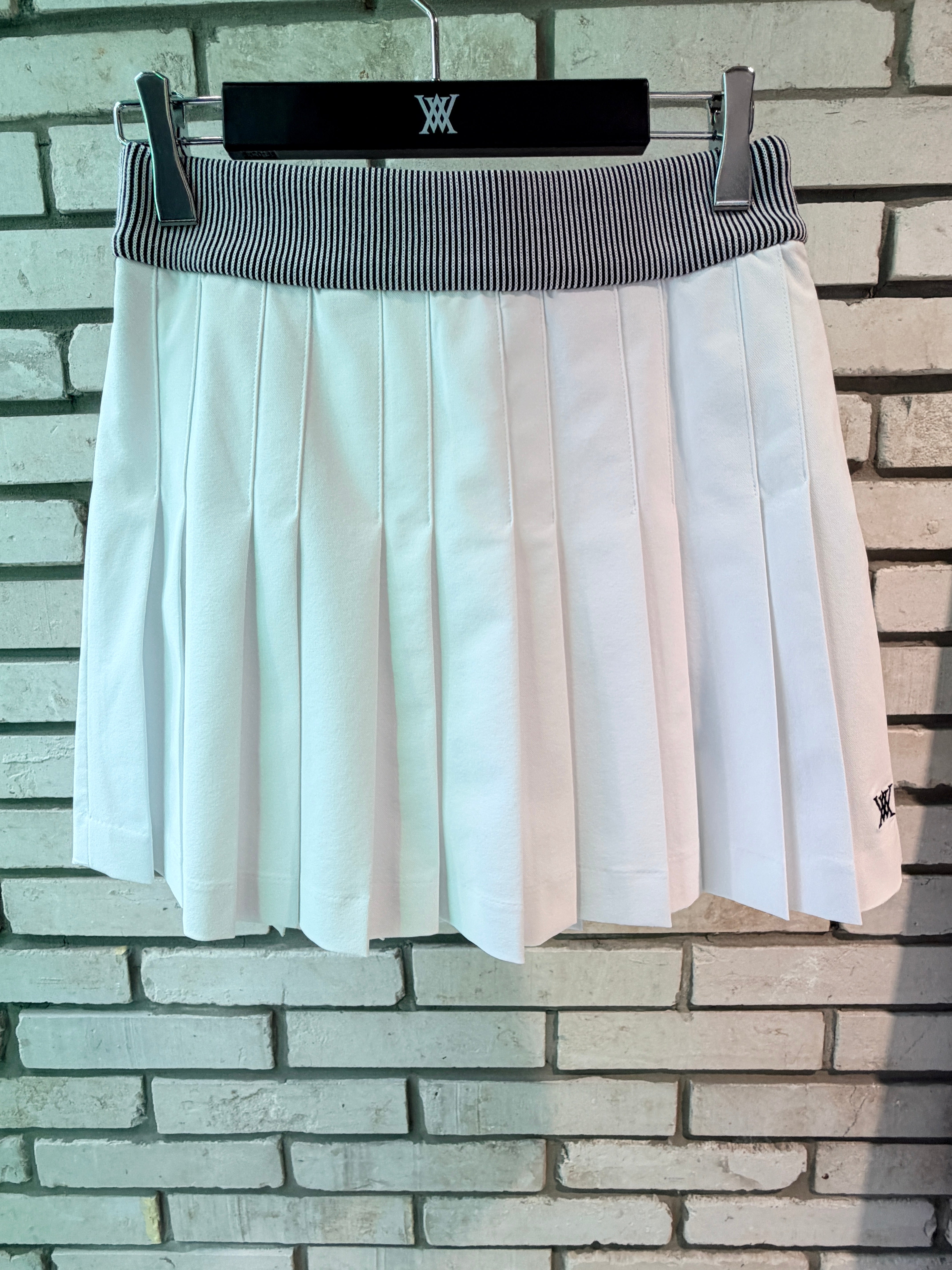 WOMEN ESSENTIAL PLEATS SKIRT